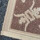 Persian rug in beige wool with woven flowers 290x190cm