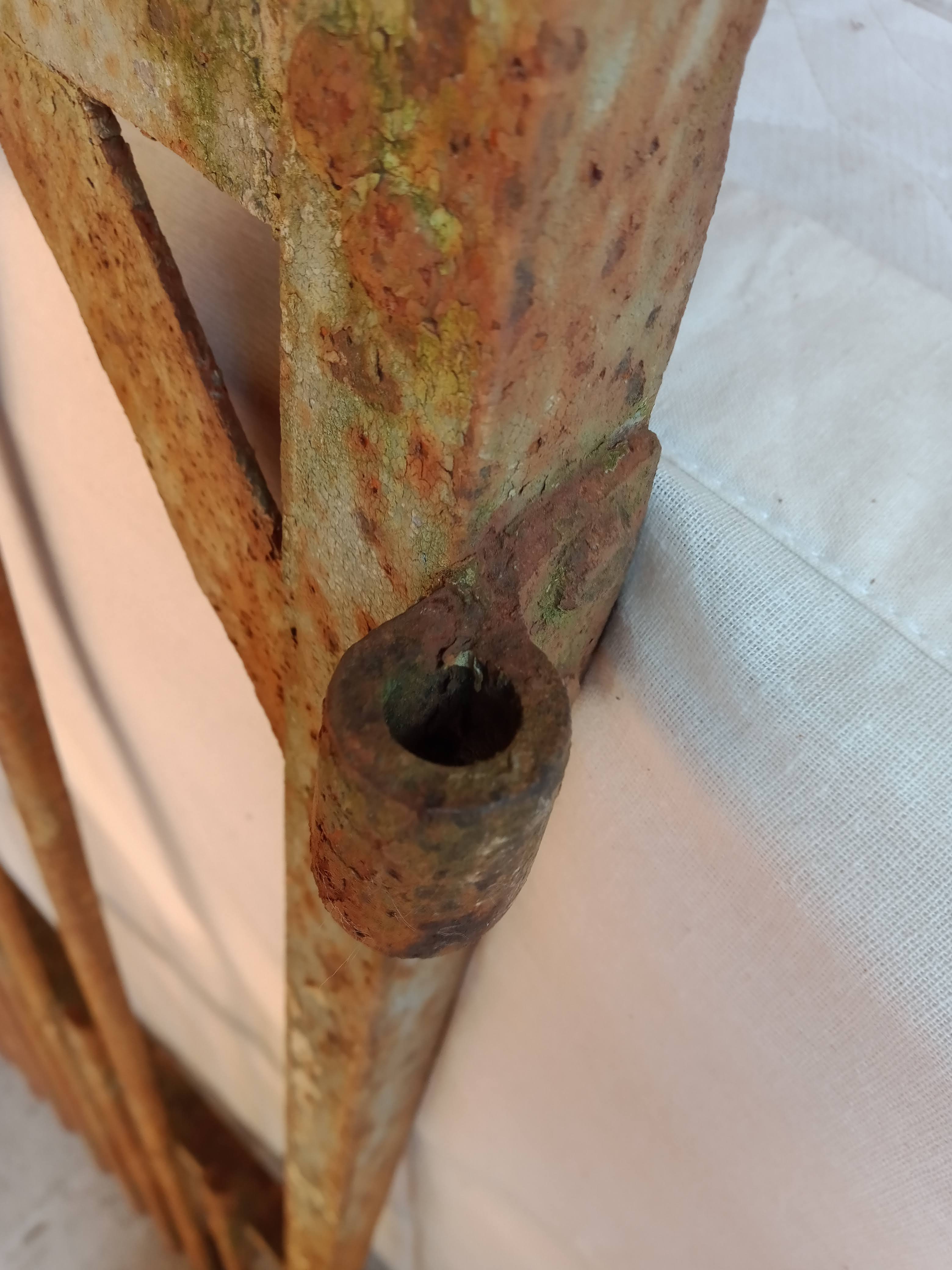 Old riveted metal gate