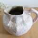 Art Nouveau ceramic pitcher with lava stone look