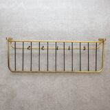 Wall coat rack made of brass