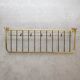 Wall coat rack made of brass