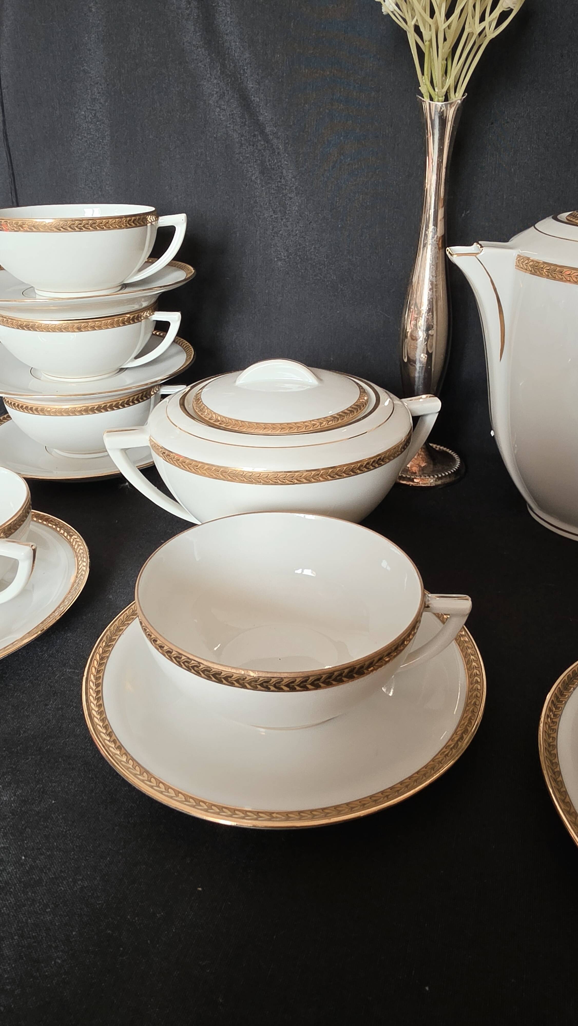 Coffee or tea service in Limoges porcelain and gold, France, Art style.