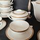 Coffee or tea service in Limoges porcelain and gold, France, Art style.