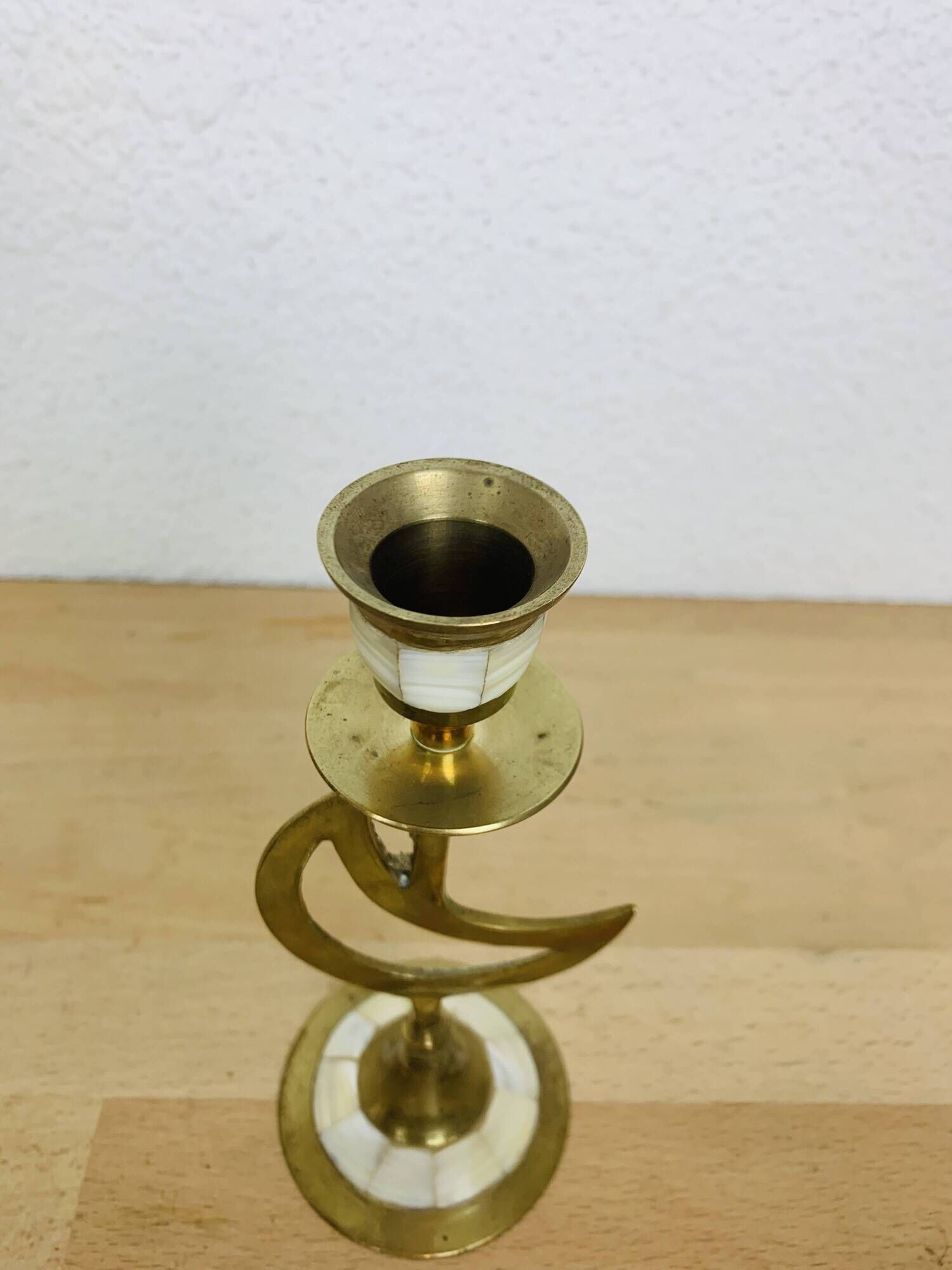 Pair of mother-of-pearl brass candlesticks with moon and sun
