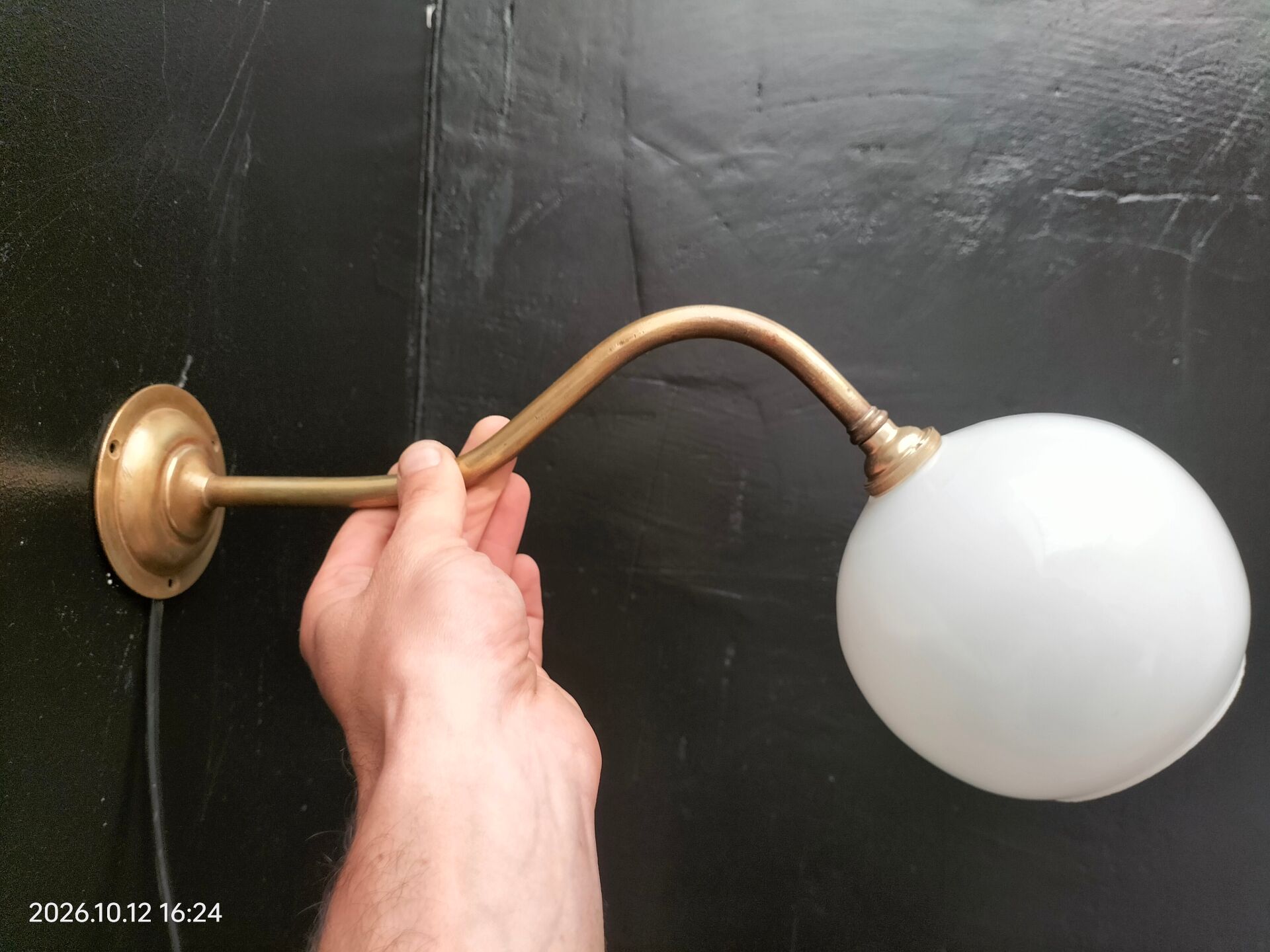 Brass and glass wall light