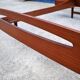 Teak bed with hanging bedside tables from the 60s