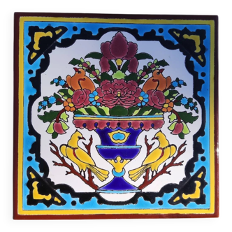 Ancient Iranian faience tile decorated with birds