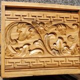 Bas relief in carved wood