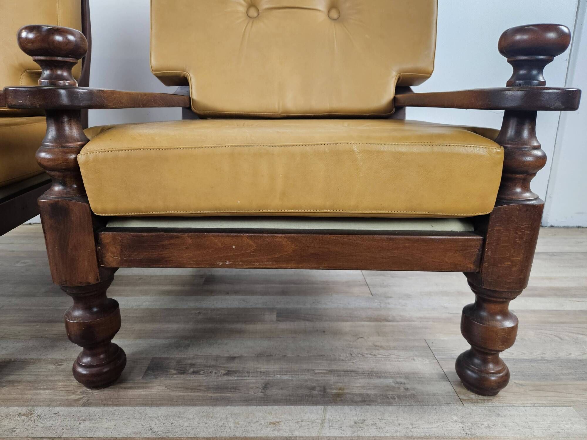 1980s leather and solid wood armchairs