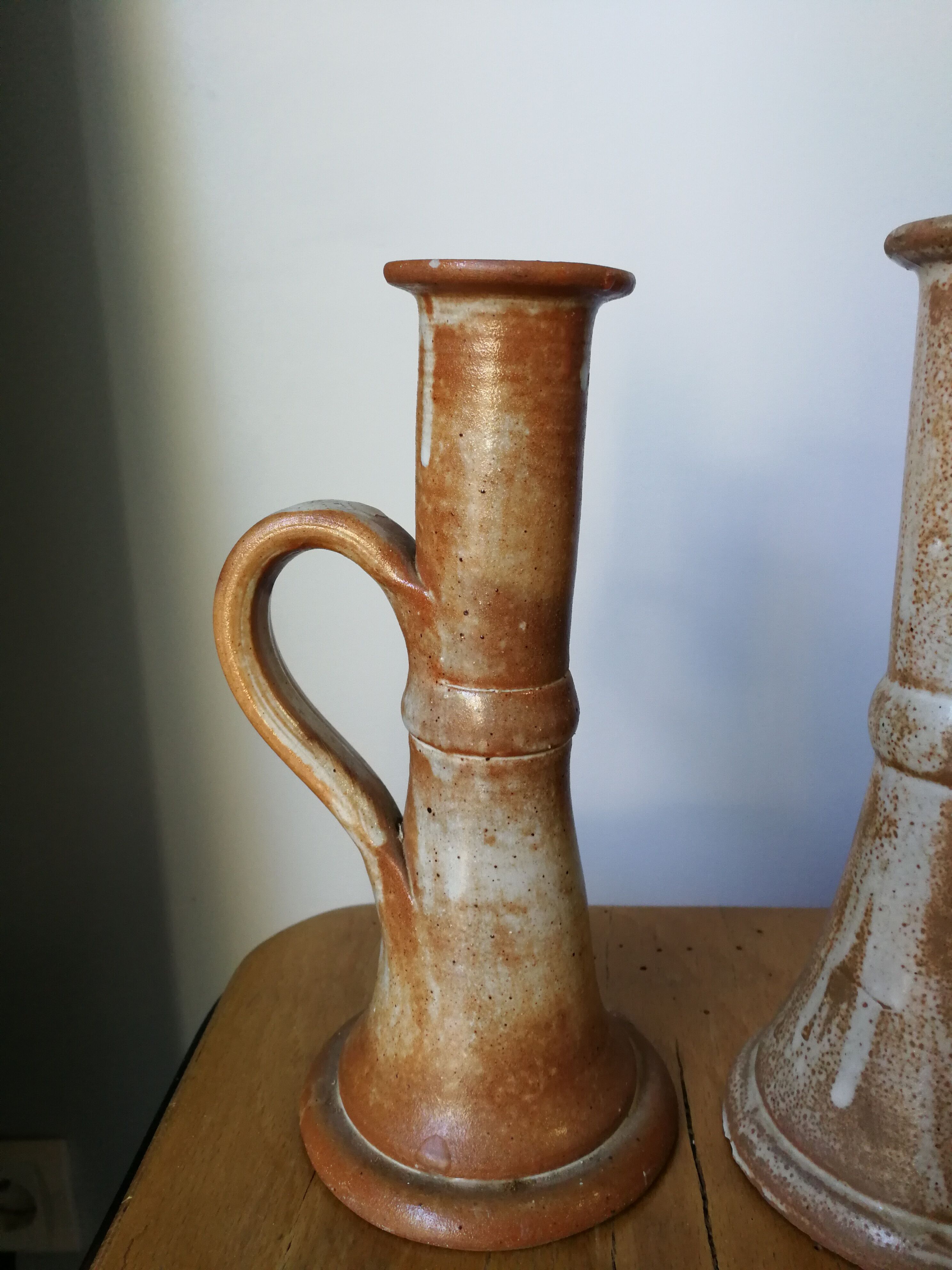 Pair of glazed stoneware candle holders