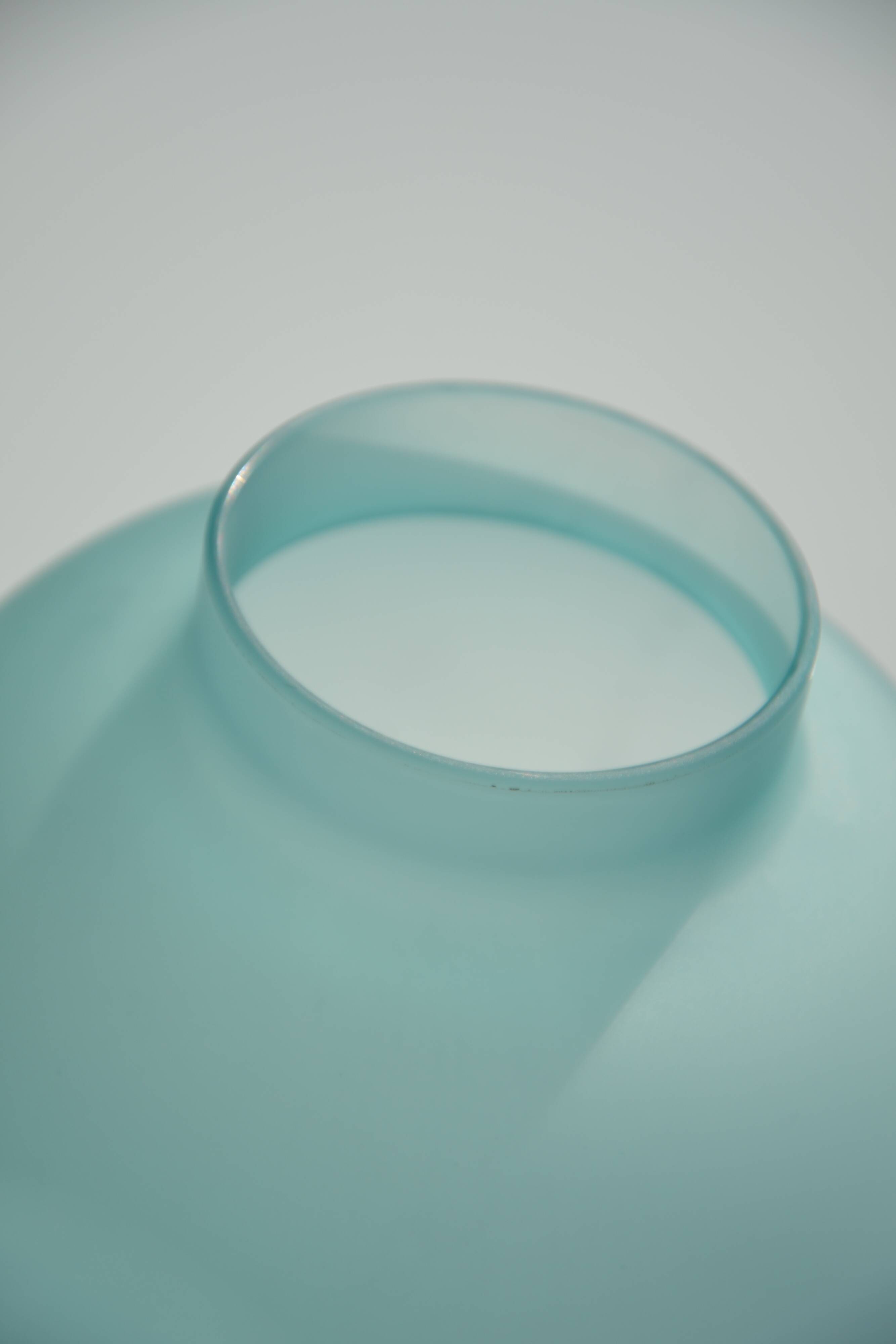 Blue frosted glass bottle/vase on foot