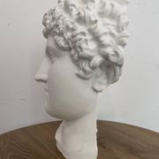 White plaster Greek head