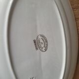 Plat ovale en porcelaine opaque de la faïence de Lunéville