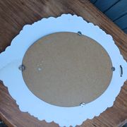 Miroir ovale avec cadre blanc 