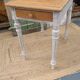 Antique drawer table with a patina.