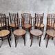 Series of 7 old bar cane cane bistro chairs