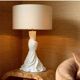 Pair of white and brass table lamps, linen shades.