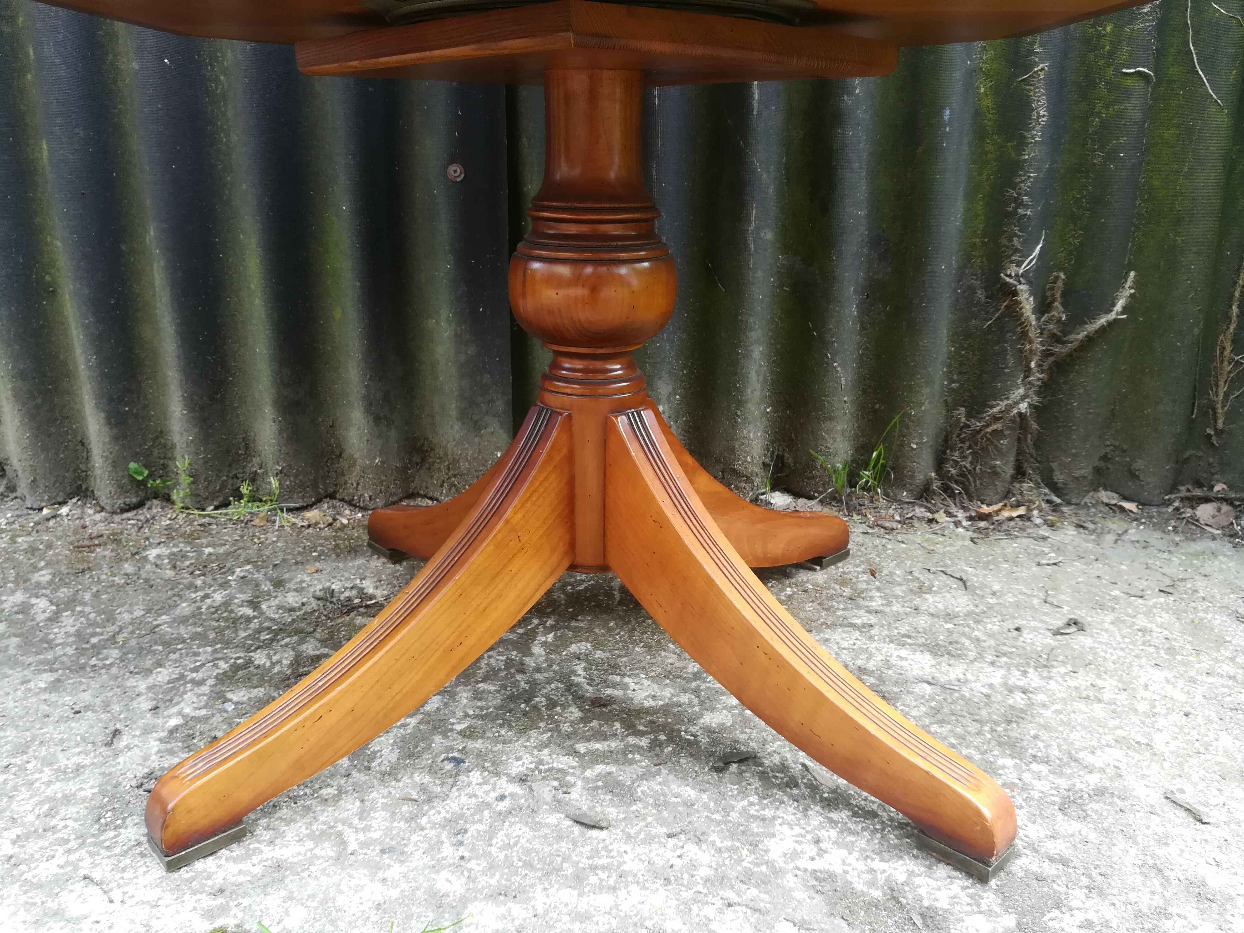 Storage cabinet revolving in cherry