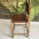 Unique Hungarian handcrafted chair in oak and leather.