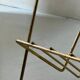 Side table - perforated metal magazine rack, designed by Matégot