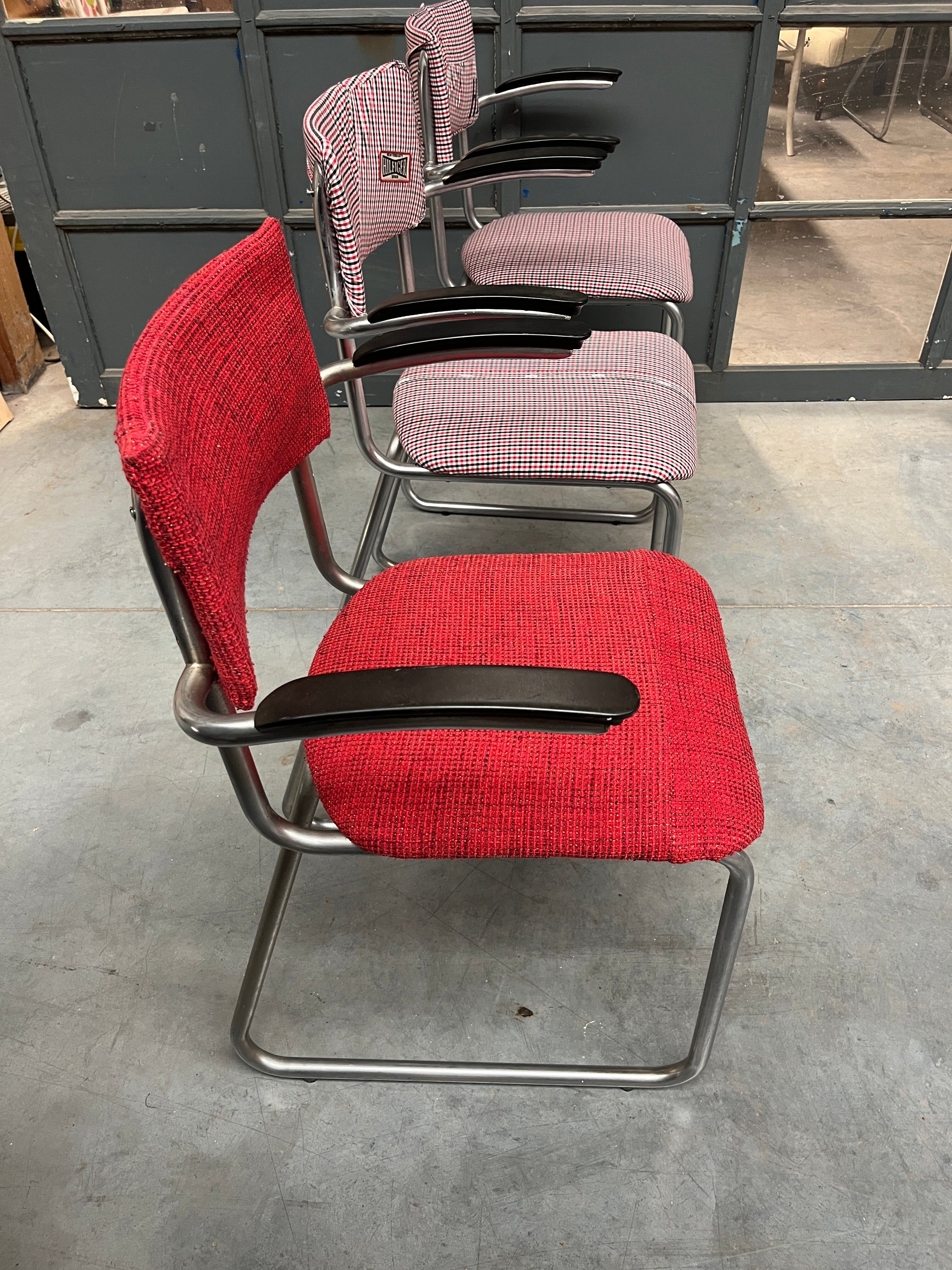 Set of 3 vintage cantilever chairs reupholstered.