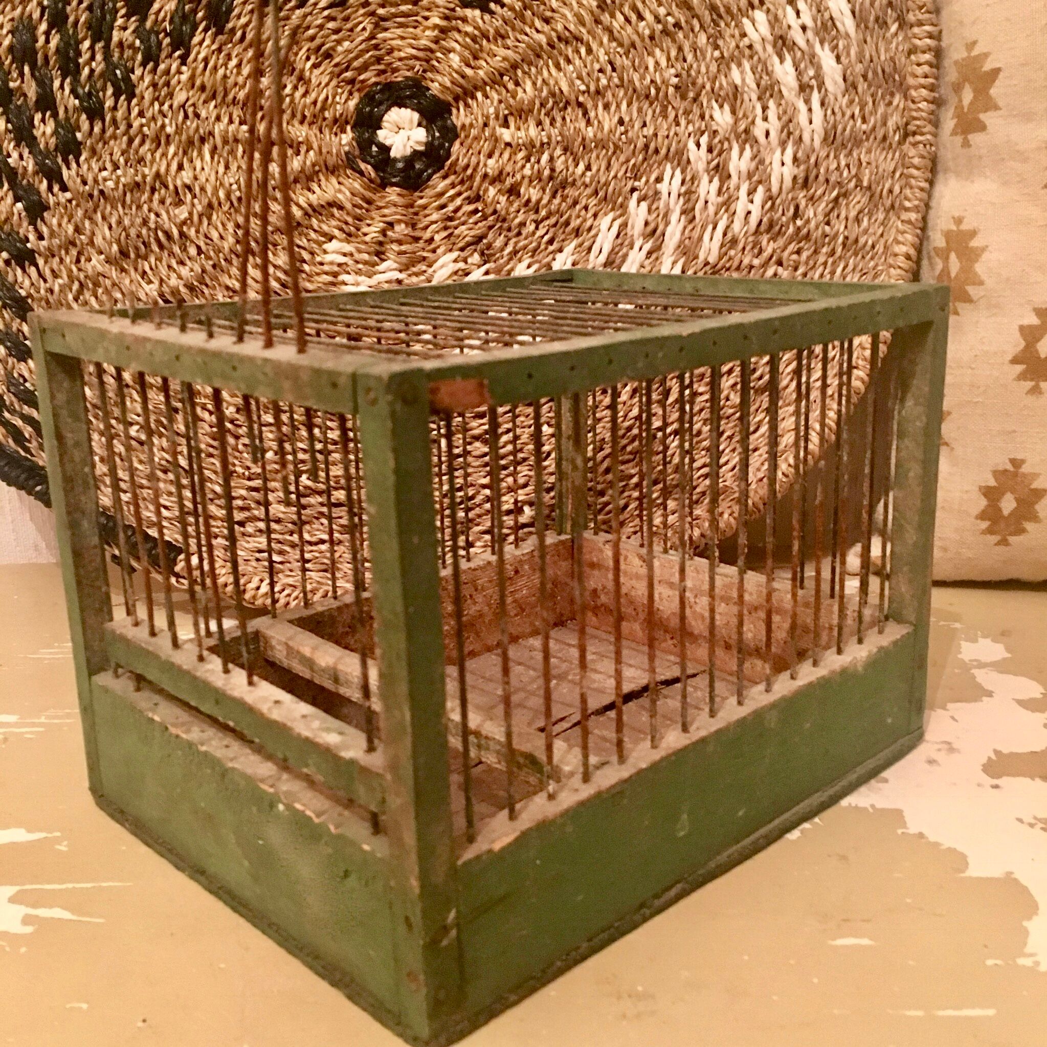 Green wooden bird cage