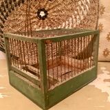 Green wooden bird cage