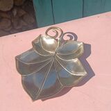 Gilded brass leaf pocket emptier