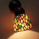 Tiffany lamp, stained glass and tin.