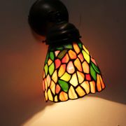Tiffany lamp, stained glass and tin.