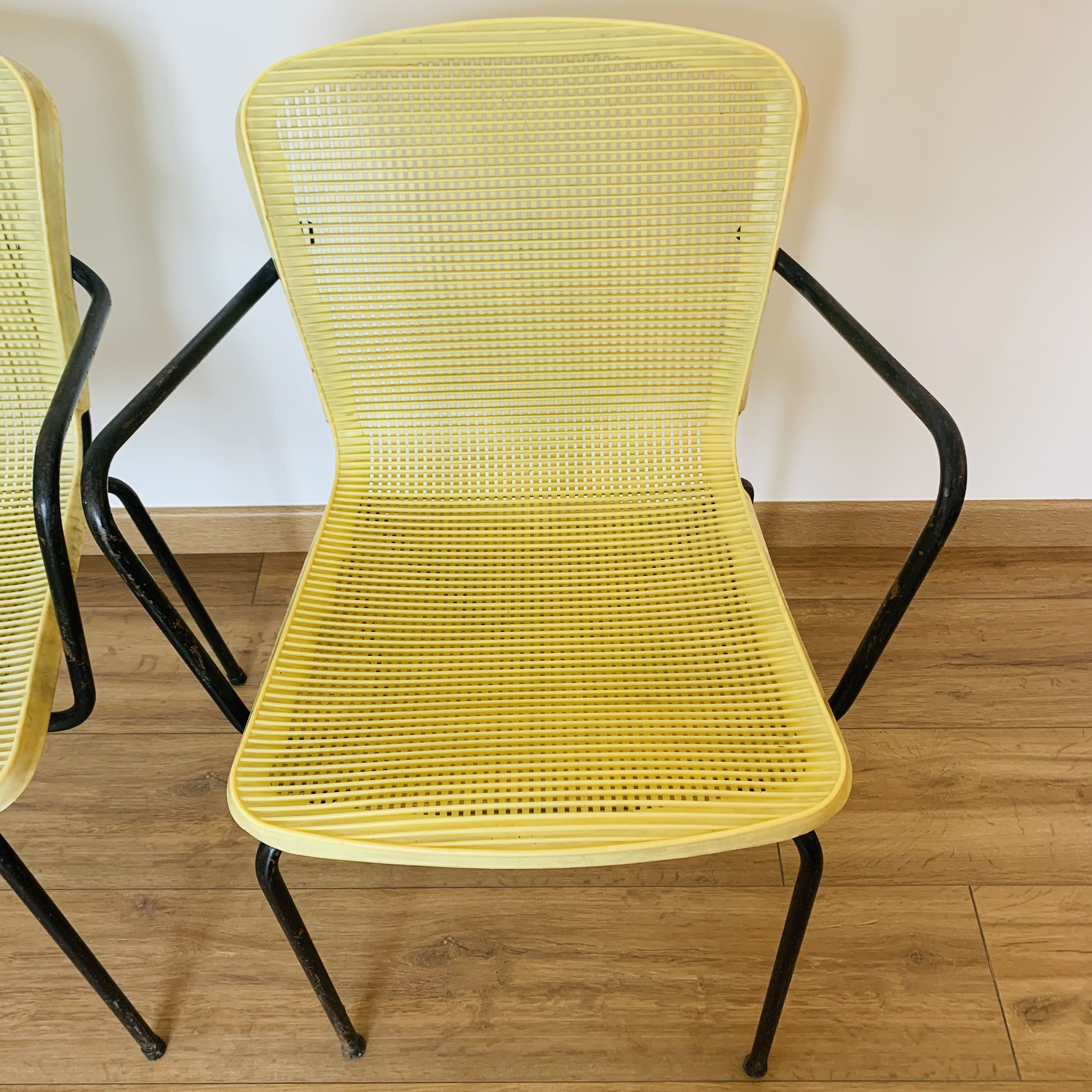 4 yellow outdoor armchairs