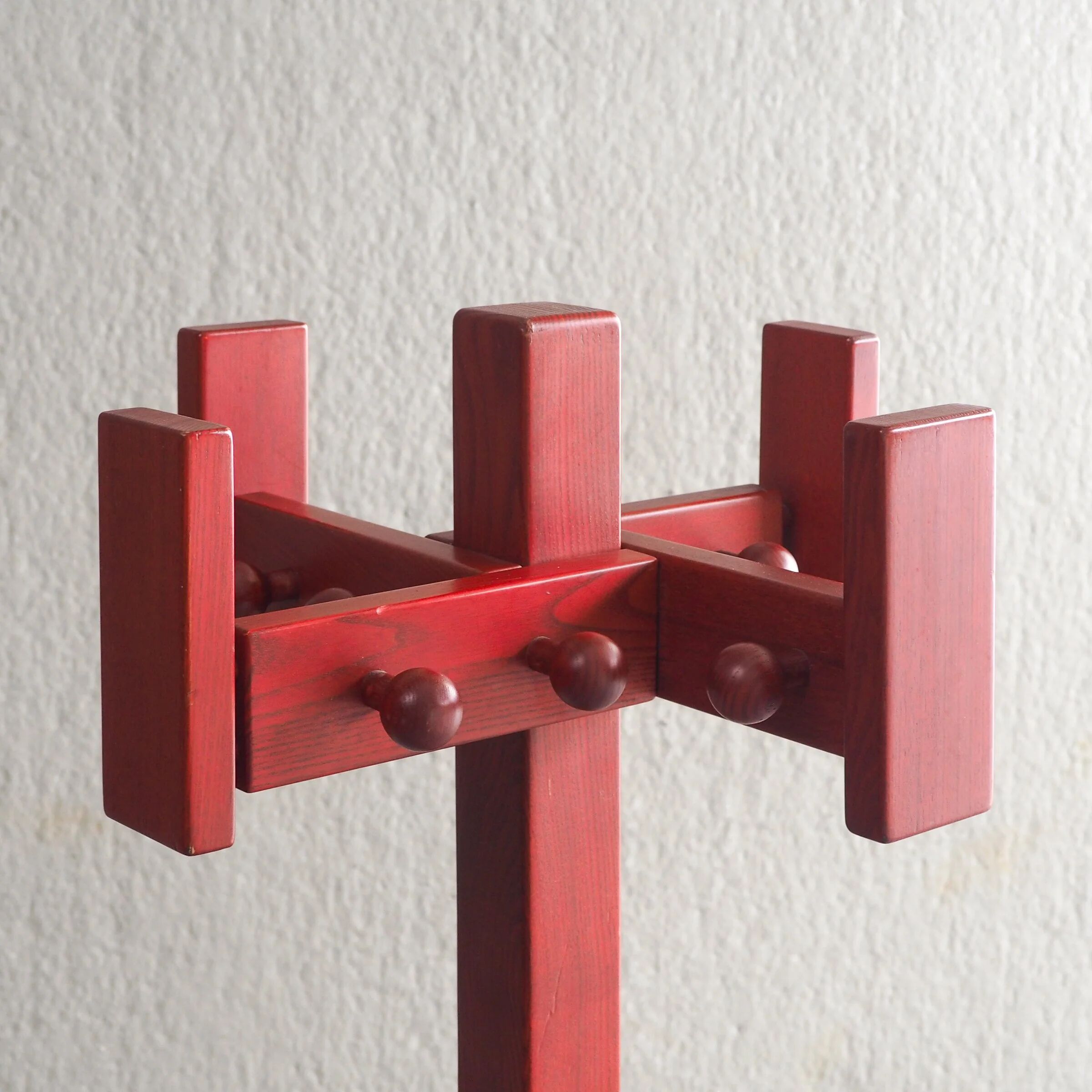 Postmodern red stained pine wood coat hanger