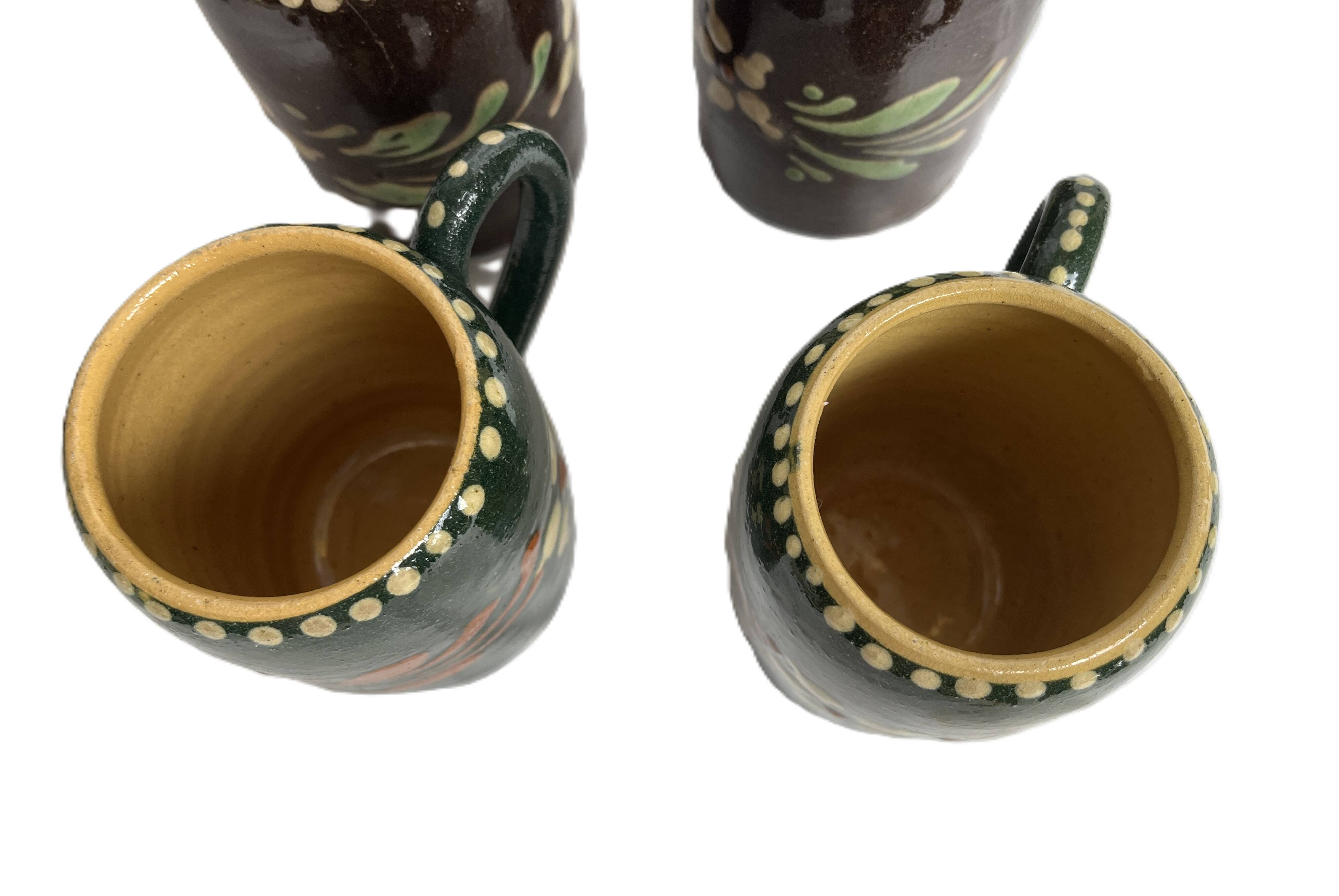 Alsatian pottery, glazed stoneware mug from Soufflenheim, 20th century.