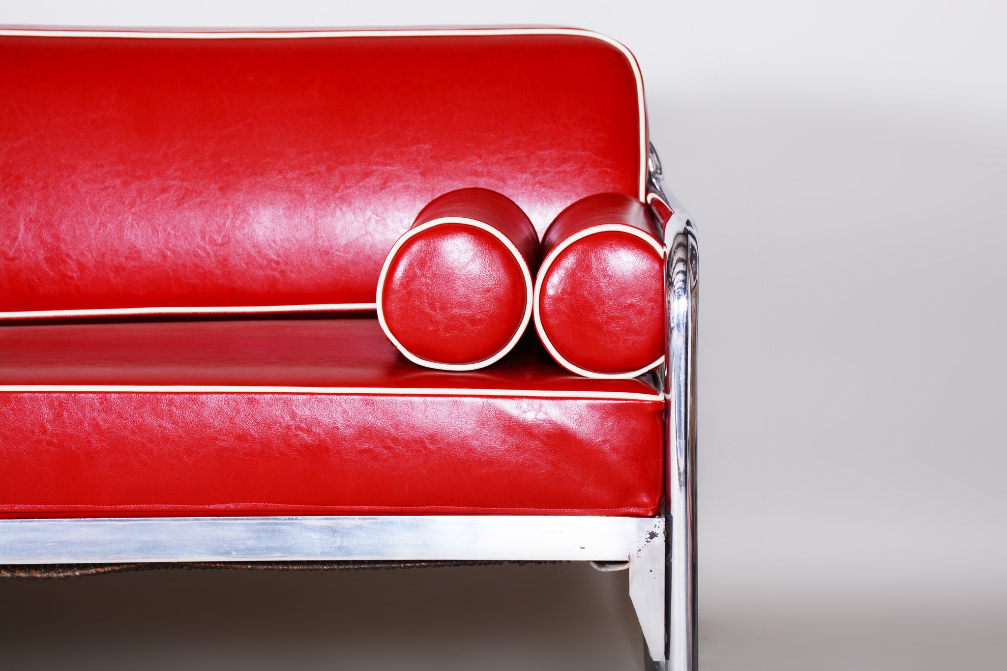 Red leather sofa by Hynekk Gottwald 1930