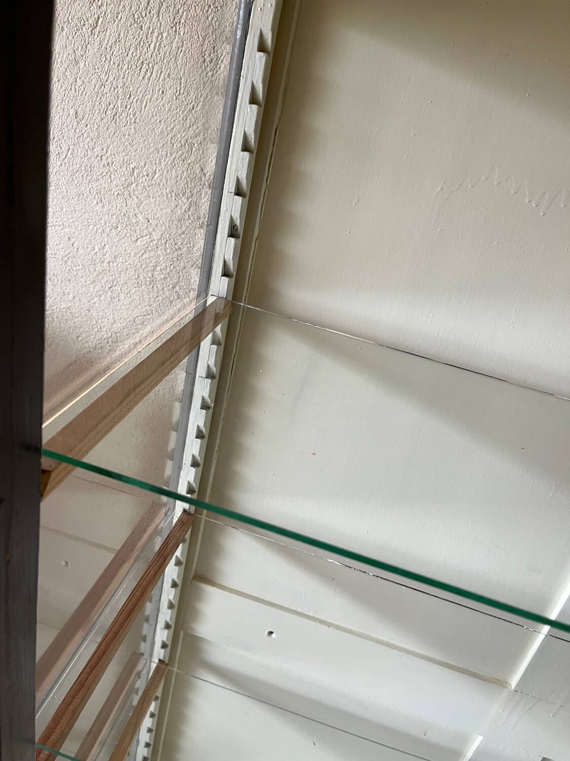 Old wooden glass display case