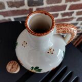 Old earthenware brandy bottle