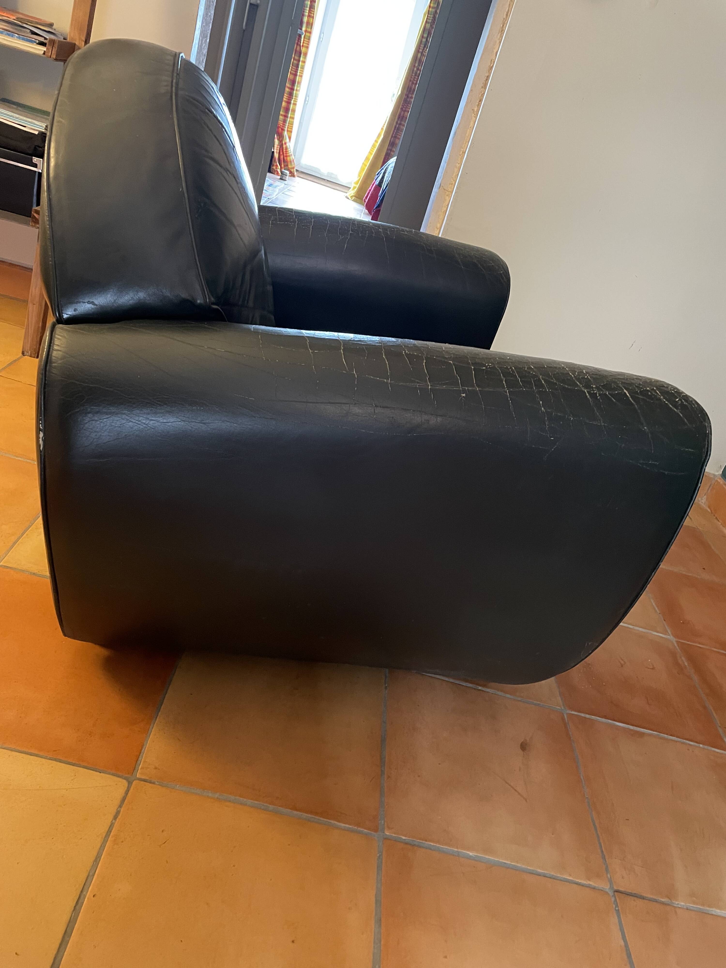 Green leather club chairs