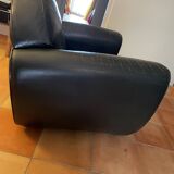 Green leather club chairs