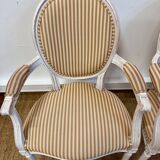 Pair of Louis XVI style medallion armchairs