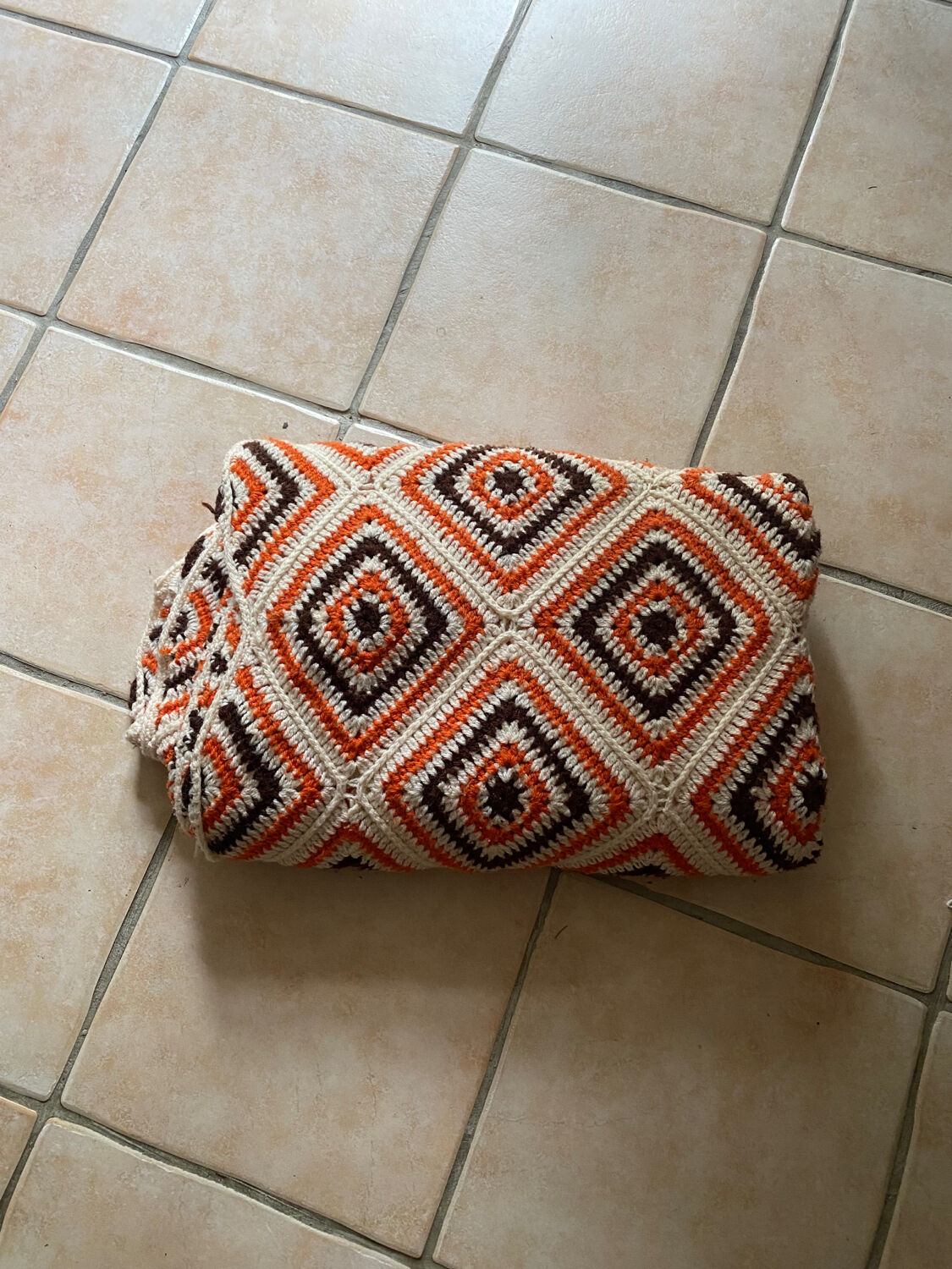 Orange and brown crochet throw