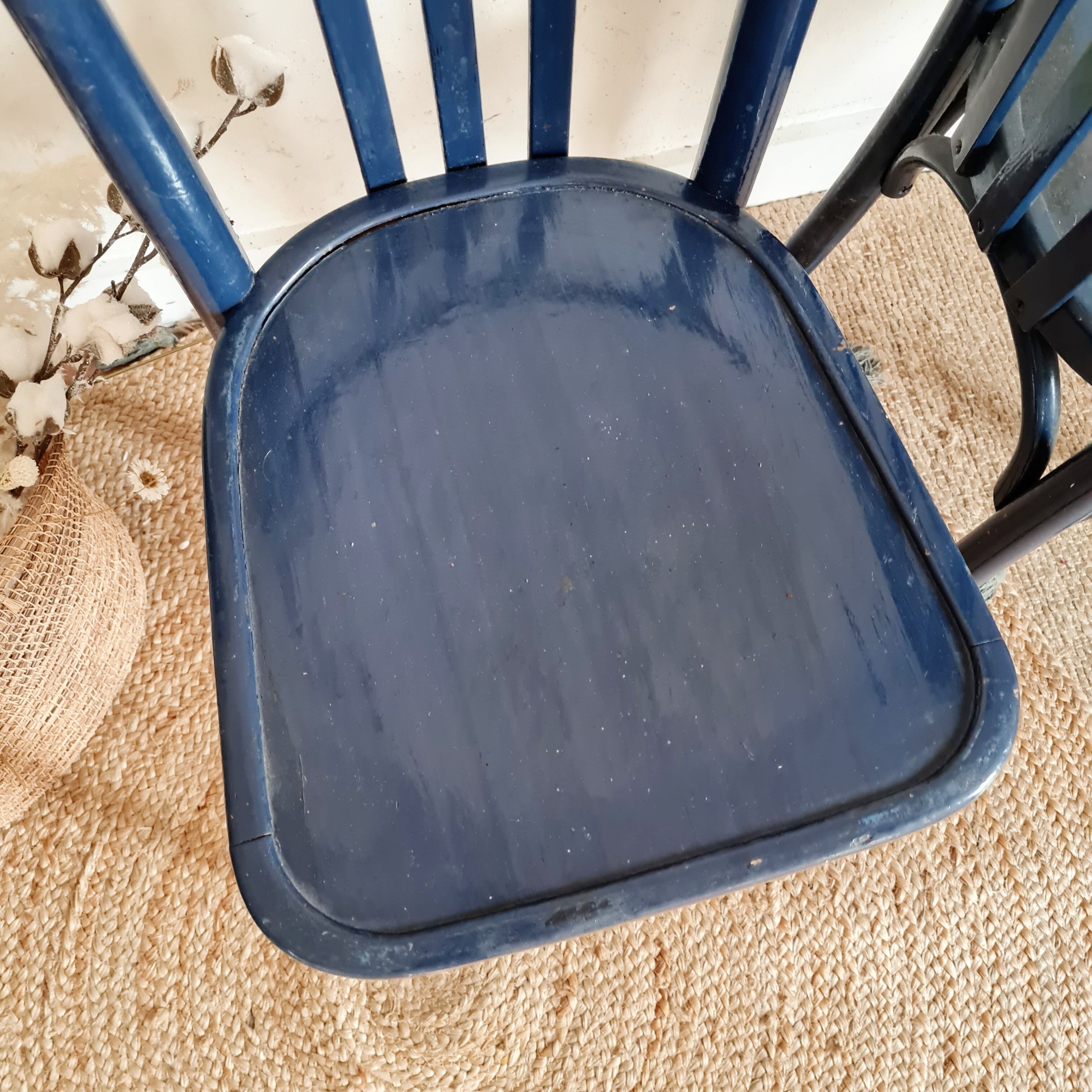Duo of old blue bistro chairs