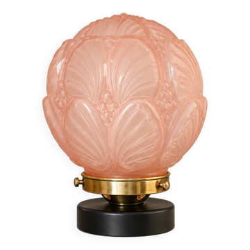 Penelope — Art Deco table lamp in sculpted pink glass, black brass base.