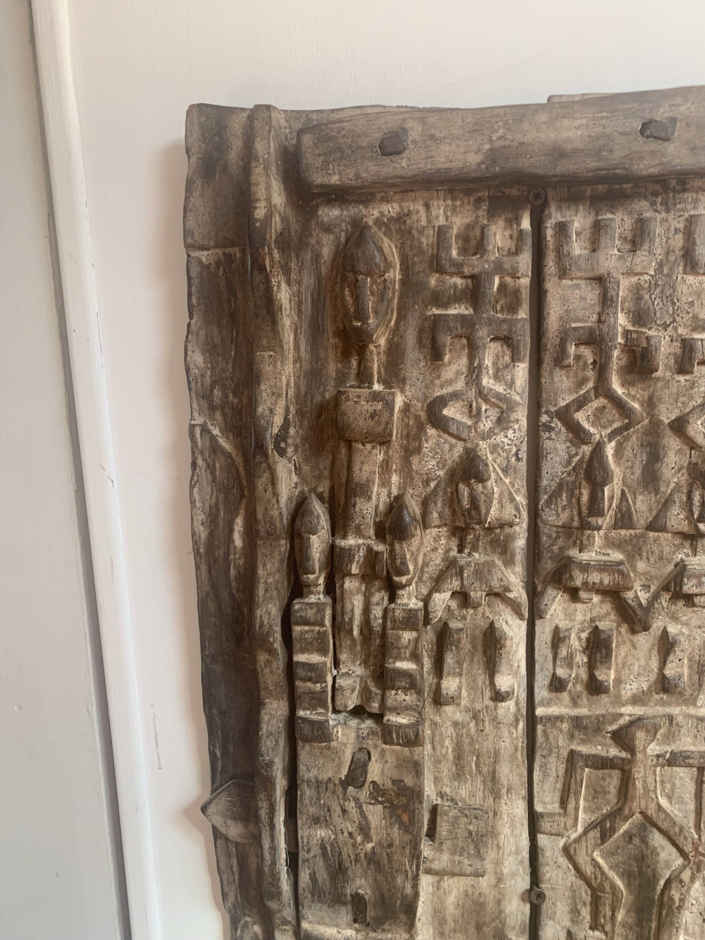 Old carved African door in solid wood – ethnic decoration – pi