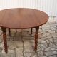 Round oval table with solid cherry leaves, 19th century