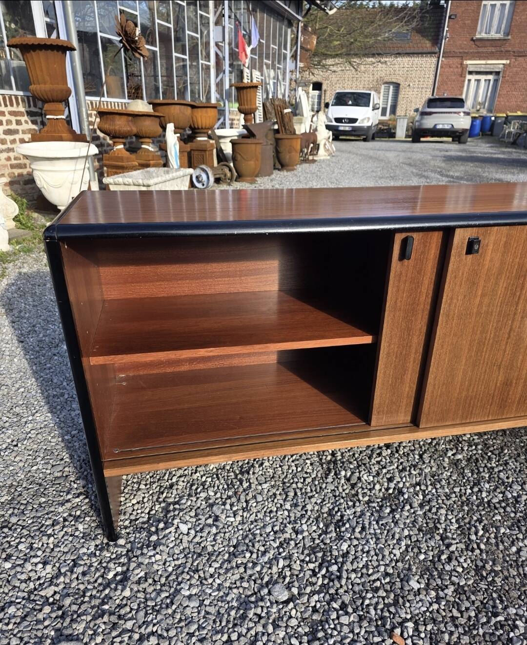 Vintage sideboard with sliding doors from the 60s
