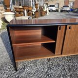 Vintage sideboard with sliding doors from the 60s