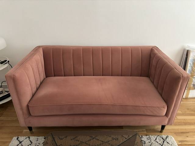 Compact powder pink sofa made