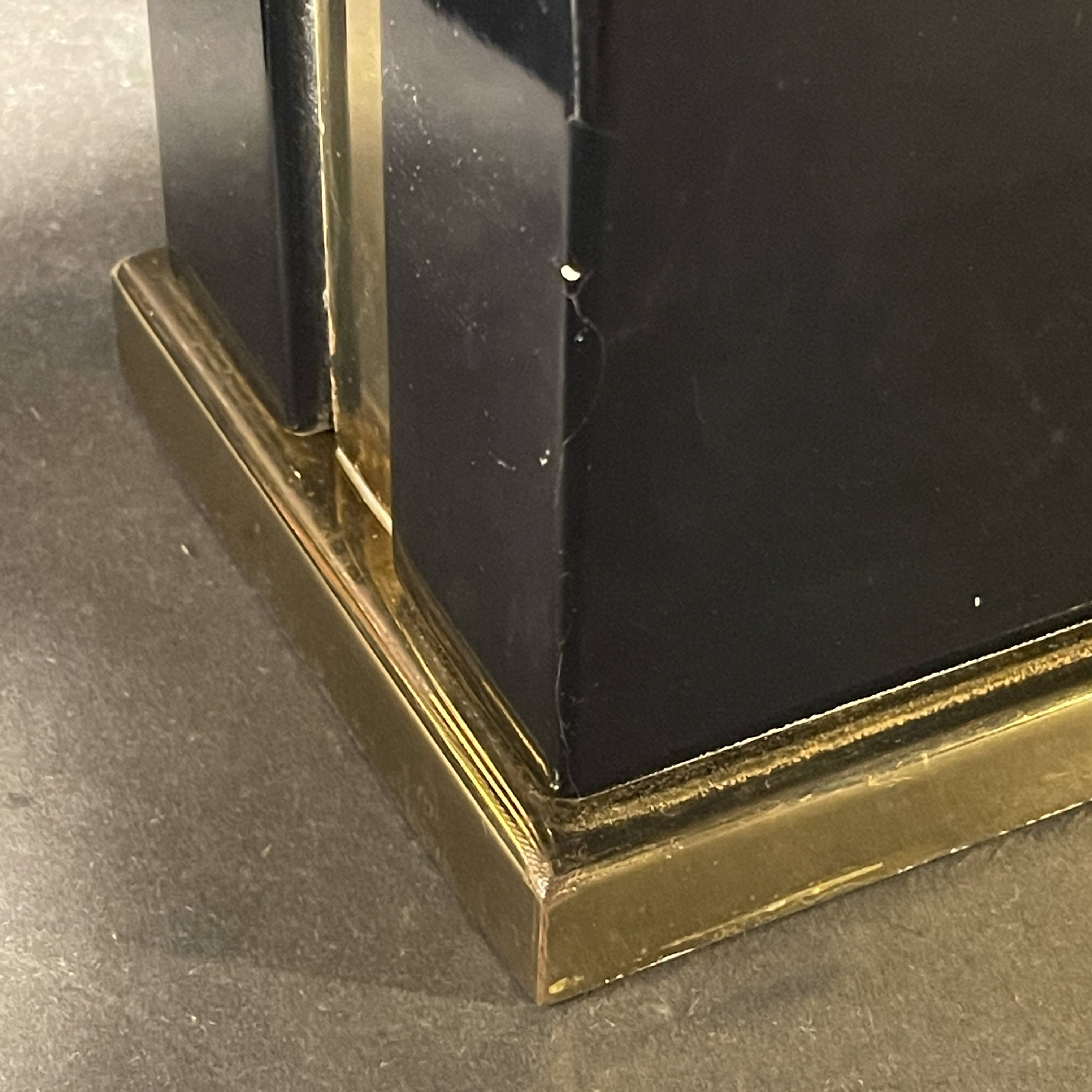 Pair of black lacquered and brass table lamps, circa 1970