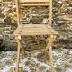 Antique folding chair with wooden slats