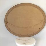 Cadre ovale en bois sculpté doré
